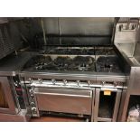 SS Gas Stove, 8-Burner, 4 ft x 3 ft x 5 1/2 f Located: Main Kitchen, adjacent to Palace Grill