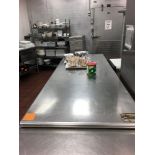 SS table 8 ft x 3 ft x 3 ft Located: Main Kitchen, adjacent to Palace Grill Asset #: N/A ***NOTE