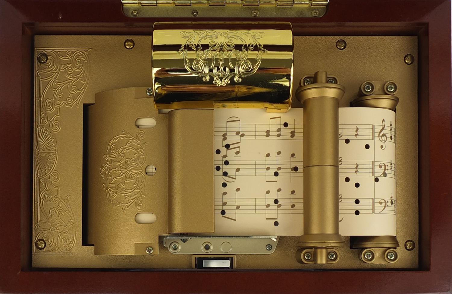 Boxed gold label collection music in motion musical box, 21cm high x