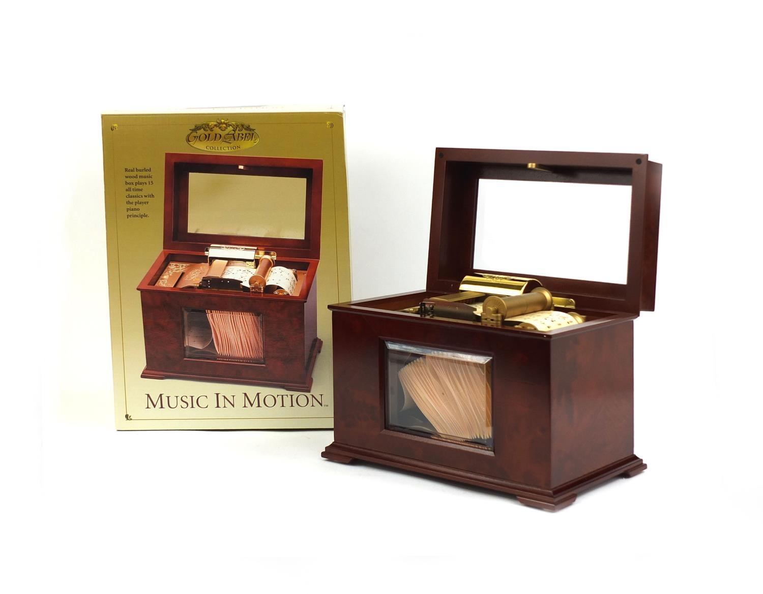 Boxed gold label collection music in motion musical box, 21cm high x