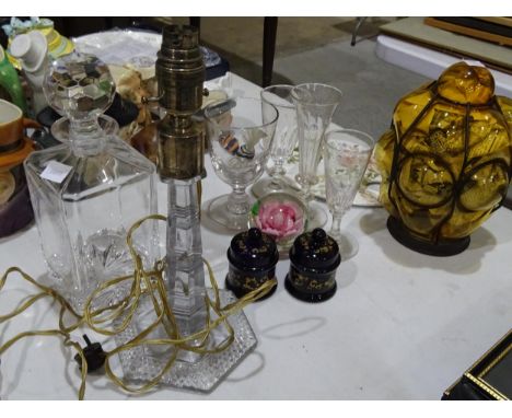 A 19th century glass rummer, a glass table lamp with plated mount, a metal-bound amber glass lightshade and other glass ware.