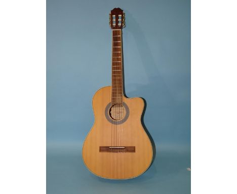 A Chinese-made six-string guitar, model C4/4CE, a&nbsp;Yamaha Soprano descant recorder and two other recorders, (4). 