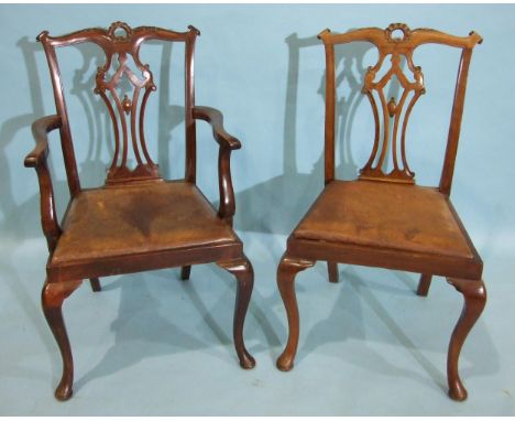 A set of six reproduction mahogany Chippendale-style dining chairs with drop-in seats, on cabriole front legs, includes one c