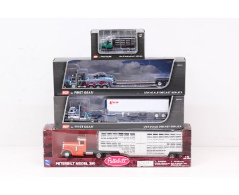 Diecast: A collection of four boxed diecast model vehicles to comprise: NewRay 1:43 Peterbilt Model 380; and three DCP by Fir