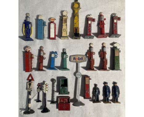 Diecast: A collection of assorted diecast petrol pumps and road signs, together with three lead station staff figures. Playwo