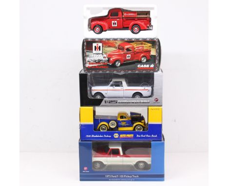 Diecast: A collection of four boxed diecast vehicles to include: First Gear 1973 Ford F-100 Pickup Truck 1:25; Napa Auto Part