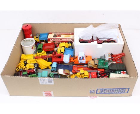 Diecast: A collection of assorted vintage and modern unboxed diecast vehicles to include: First Gear, Matchbox, Triang Minic,