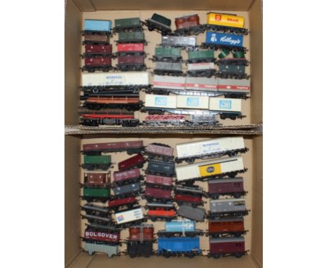 Model Railway: A collection of assorted model railway OO Gauge rolling stock containers, wagons, tankers and others. Unboxed.