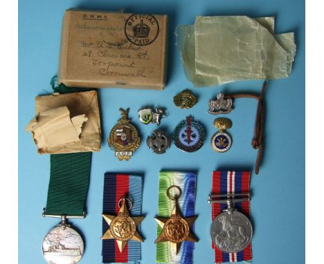 A Royal Fleet Reserve Long Service and Good Conduct medal awarded to 348 E C  A E Tucker E R A 1 RNR, along with 1939-45 and 