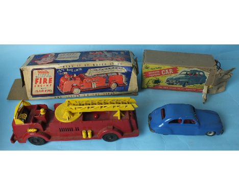 A Chad Valley remote control car, clockwork, tinplate,  a "Reliable" clockwork fire engine of plastic construction, and a Vul