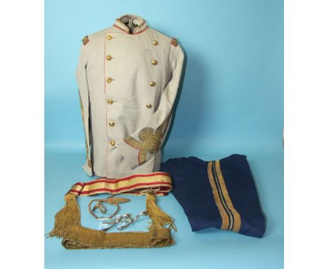 A gentleman's uniform tunic, trousers and belt, made by A Giuliana, Cairo, bearing label "Grandfather's tunic, trousers and s