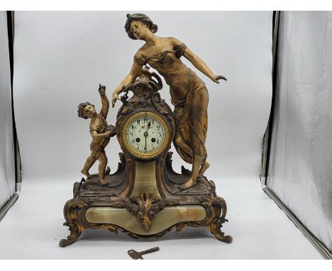 Antique Art Nouveau Figural Spelter and Green Onyx Mantel Clock depicting mother's adoration for her child. 
