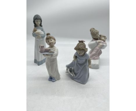 Four NAO Porcelain Girl Figurines. 
Good condition, no damage. 