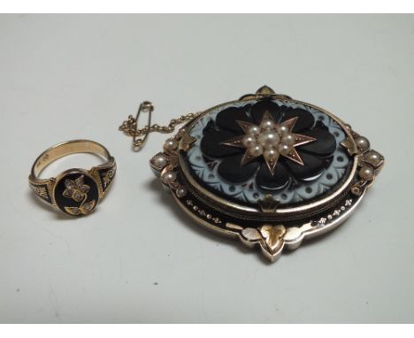 A VICTORIAN 9CT GOLD MOURNING RING, having black enamel and gemset floral embellishment, together with a Victorian yellow met