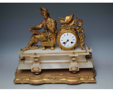 A FRENCH GILT METAL AND ALABASTER FIGURAL MANTEL CLOCK, the eight day movement striking on a bell, W 42 cm, H 33.5 cm, raised