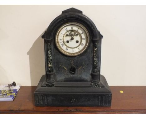 A VICTORIAN SLATE MAUSOLEUM MANTEL CLOCK, the enamel dial with Roman numerals, the arched case with half marble columns, H 42