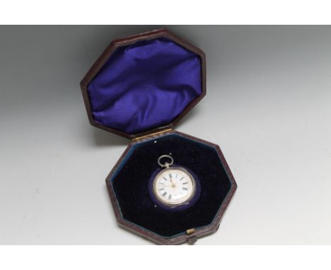 A SILVER OPEN FACED MANUAL WIND FOB WATCH IN FITTED OCTAGONAL CASE, having white enamel dial, Roman numeral hour markers, out