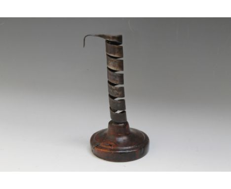 A C18TH CENTURY IRON AND WOOD SPIRAL CANDLESTICK, H 18.5 cm