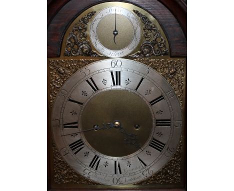 AN EARLY 18TH CENTURY MAHOGANY CASED LONGCASE CLOCK BY JAMES LEICESTER - DRURY LANE - LONDON, the 12" arched silvered dial wi