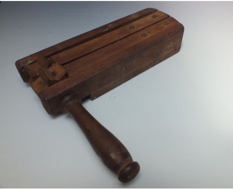 A 1941 ARP AIR RAID WARDENS WOODEN RATTLE, stamped B & E Ltd, A R P 1941