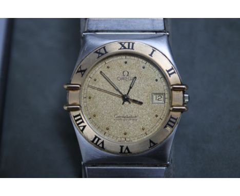 A BOXED GENTS OMEGA CONSTELLATION CHRONOMETER DATE 1431,  having textured gold dial, dot hour markers, secondary outer minute