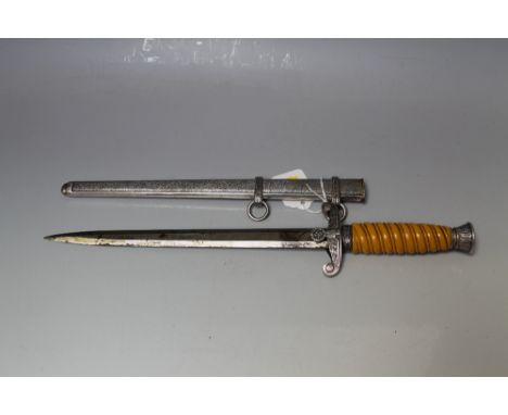 A NAZI STYLE DAGGER IN SCABBARD, made by F.W. Holler, Berlin, blade L 25 cm