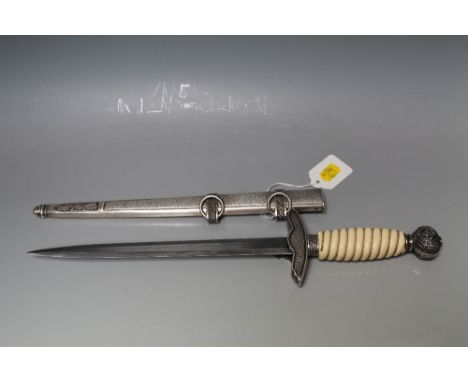 NAZI STYLE LUFTWAFFE DAGGER IN SCABBARD, bearing mark on blade and Paul Weyersberg & Co. Berlin, blade length 26 cm