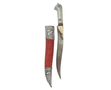 An Indian jade hilted dagger (kard), single edged blade 10 in. and of slightly flamboyant form, the forte partly enclosed by 