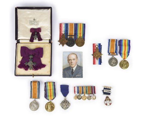 A family collection of medals, comprising: The Most Excellent Order of the British Empire, a Lady Member's badge, cased and w