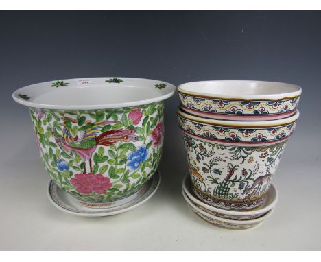 A large Chinese famille rose planter and stand, together with two other examples