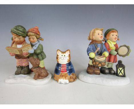 Two Goebel Hummel figures and a signed and dated Dorset Wonderland Miniature Ornaments cat