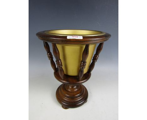 A turned wooden planter