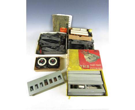 [Model railway] A quantity of Trix track together with a station and rolling stock