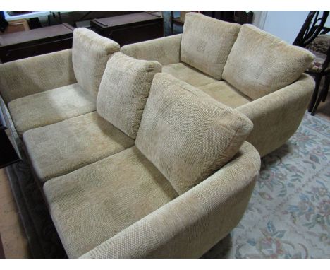 A contemporary pale gold dralon suite, comprising three seater and two seater sofa, with the three seater converting into a s