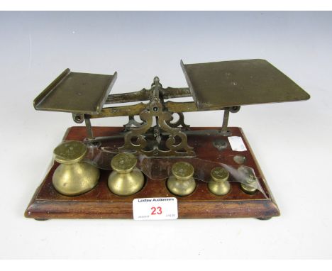 Antique brass postal scales with weights