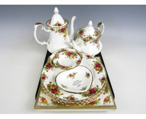 A quantity of Royal Albert Old Country Roses tea ware including a teapot, coffee pot and plates etc
