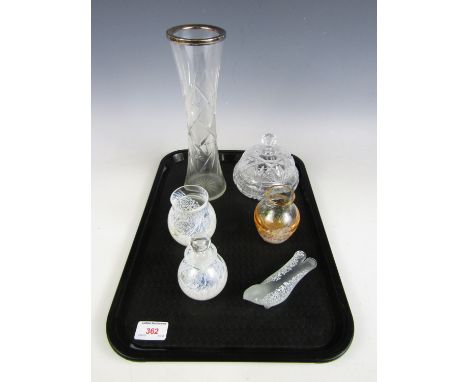 A silver rimmed cut glass vase together with a cut glass lidded bowl, a Caithness scent bottle and three other similar pieces