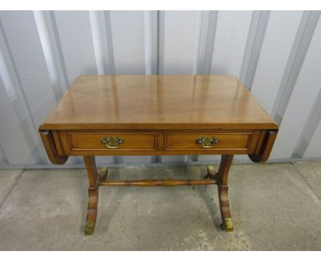 A mahogany sofa table