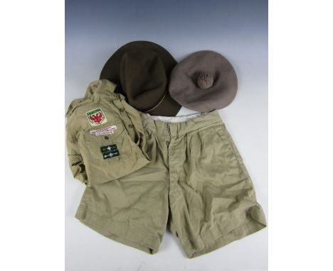 A group of vintage Boy Scout clothing and headdress