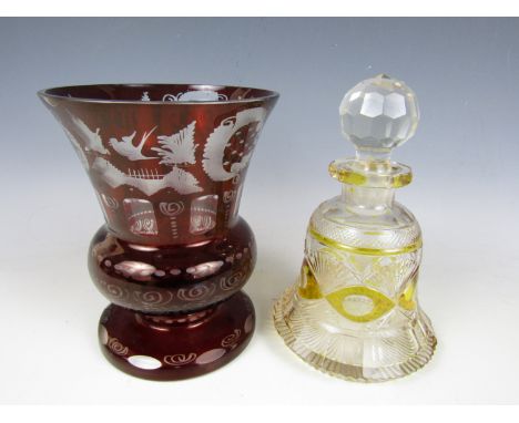 A 19th Century Bohemian ruby flashed and cut glass vase together with a similar decanter
