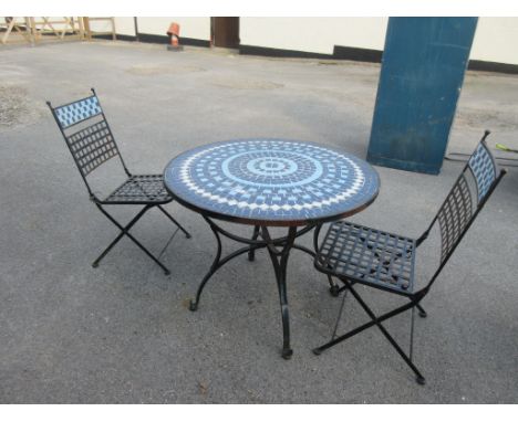 MOSAIC DECORATED VINTAGE METAL PATIO TABLE APPROX 90CM DIAMETER TOGETHER WITH TWO MATCHING FOLDING CHAIRS