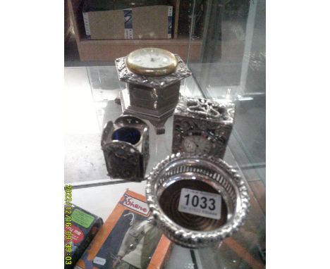 2 small quartz clocks in silver plated cases, + a bottle stand and 1 other item