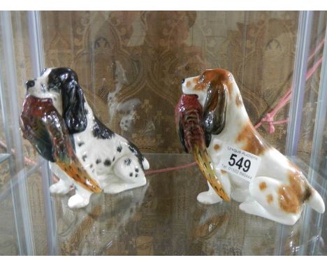 Two Royal Doulton hunting dogs.Both appear undamaged.