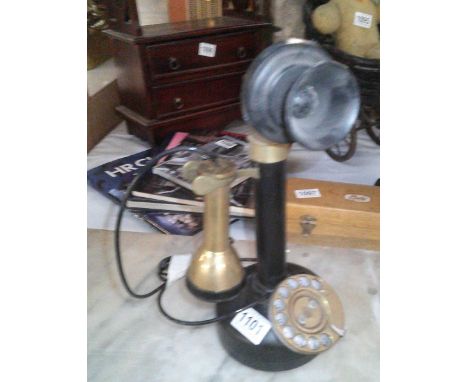 A vintage candlestick telephone