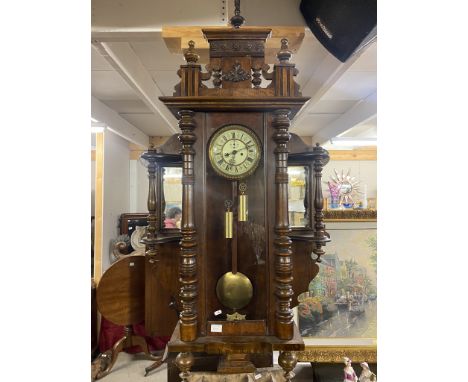 A Vienna wall clock with mirrored side panels