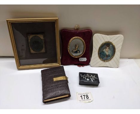 Two miniature portraits, a framed photograph, snuff box and prayer book.