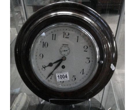 A Dent London circular wall clock.