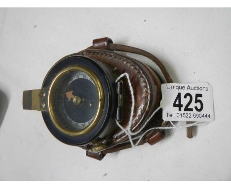 WW2 British Army prismatic compass in fitted leather pouch.