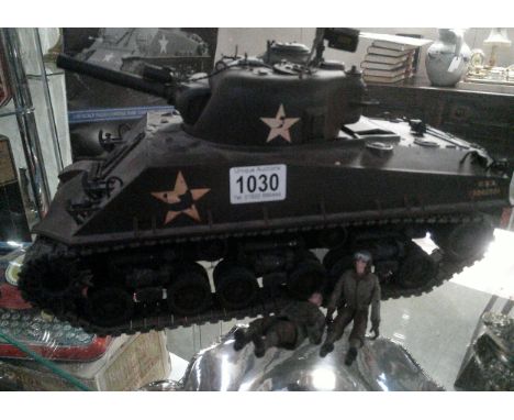 A tamiya m4 sherman 105mm howitzer 1/16 scale radio controlled tank, no hand set.Postage to UK Mainland only £20 + Vat.