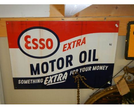 An Esso Motor Oil sign.